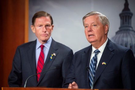 United States Senator Lindsey Graham (Republican of South Carolina), right, and United States Senator Richard Blumenthal (Democrat of Connecticut) offer remarks designating Russia as a State Sponsor of Terrorism during a press conference at the US Capitol in Washington, DC,.
