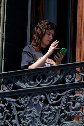 Ursula Corbero smoking on the balcony of her hotel in Venice, Italy - 12 May 2022
