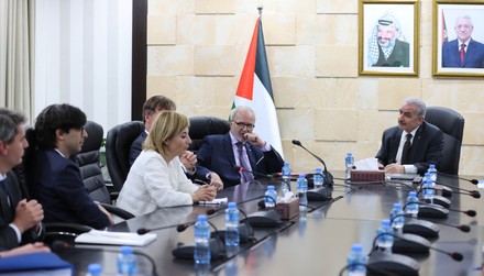Palestinian Prime Minister Mohammed Ishtayeh meets with European Investment Bank President Werner Hoyer, in the West Bank city of Ramallah, Ramallah, West Bank, Palestinian Territory - 15 May 2022