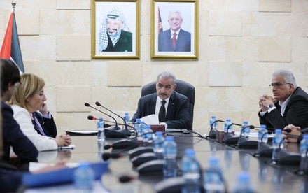 Palestinian Prime Minister Mohammed Ishtayeh meets with European Investment Bank President Werner Hoyer, in the West Bank city of Ramallah, Ramallah, West Bank, Palestinian Territory - 15 May 2022