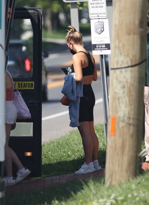 Exclusive - Sailor Brinkley Cook has her hands full as she boards the Hamptons Jitney, The Hamptons, New York, USA - 31 May 2022