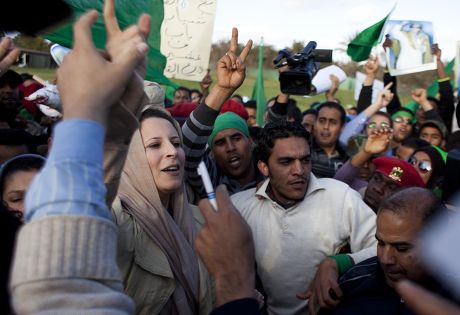 Gaddafi supporters rally to form human shield at Bab al-Azizia, Tripoli, Libya - 20 Mar 2011