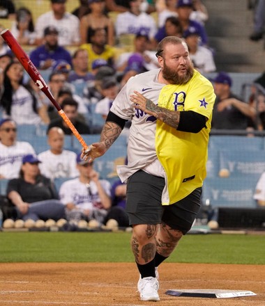 Bad Bunny looks on prior to the MGM All-Star Celebrity Softball Game  News Photo - Getty Images