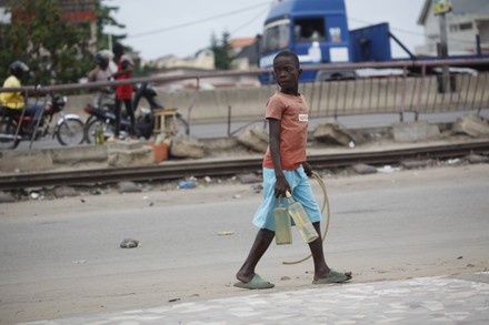 Fuel sales along a road leading to Nigeria-Seme border, Cotonou, Benin ...