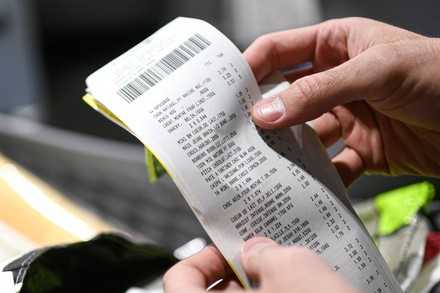 Customer Checks His Paper Receipt Exiting Editorial Stock Photo - Stock ...