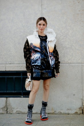 Street style, arriving at Louis Vuitton Fall-Winter 2022-2023 show