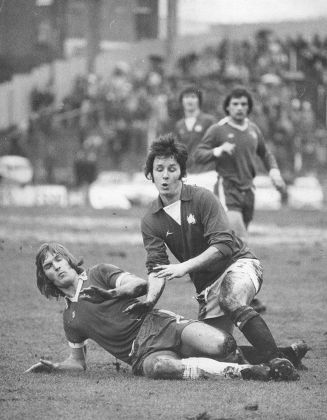Football: League Match: Chelsea V Leyton Orient. A Sliding Tackle By Chelsea's Gary Locke Robs Orient's Doug Allder During A Midfield Clash. Chelsea 1 Leyton Orient 1.