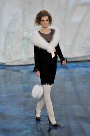A model displays a creation by designer Karl Lagerfeld for Chanel