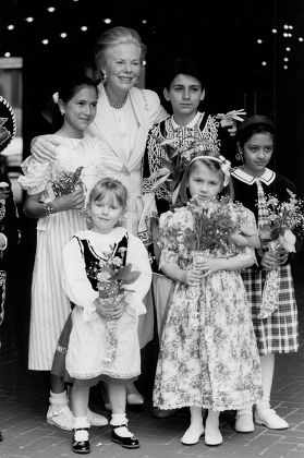 Katharine Duchess Of Kent With A Group Of Children At The Opening Of The Spring Fair At Kensington Town Hall. Profits Go To The International Social Service Which Supports Cross-border Social Work Involving Children.