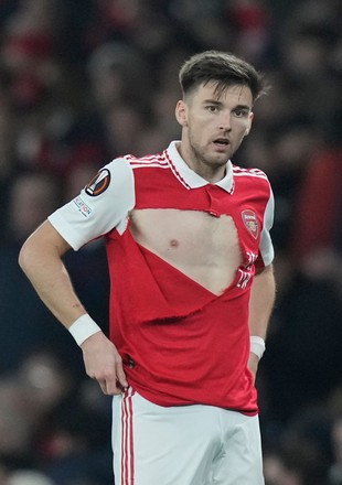 Arsenal star Kieran Tierney's shirt is almost ripped clean off by