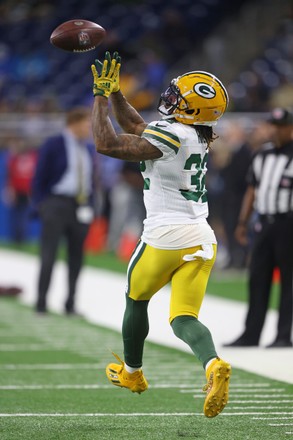 Running back (32) Kylin Hill of the Green Bay Packers warms up before  playing against the