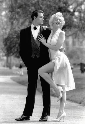 Fashions - Men - 1989 - New Formal Wear Launch . Shows: Model Stephen Billington Wears New Youngs Formal Wear With Marilyn Monroe Lookalike In Hyde Park London.