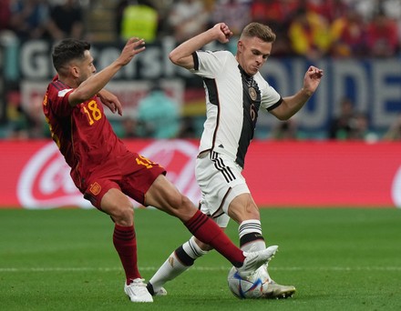 Joshua Kimmich of Germany and Jordi Alba of Spain during the FIFA World Cup  Qatar 2022 match, Group E, between Spain and Germany played at Al Bayt  Stadium on Nov 27, 2022