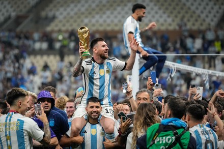 Lionel Messi of Argentina celebrates with teammate Sergio Agüero