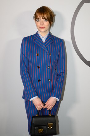 Emma Stone Suits Up in Striped Blazer at Louis Vuittons PFW Show   Footwear News