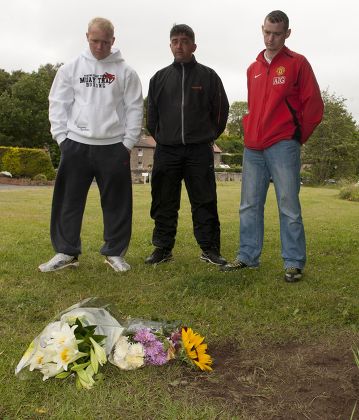 Friends Of Raoul Moat Lay Flowers At The Spot Where The Fugutive Shot Himself In Rothbury. Left To Right Are David Mccluskey Paul Sim And Stephen Mccluskey All From Seaton Down.