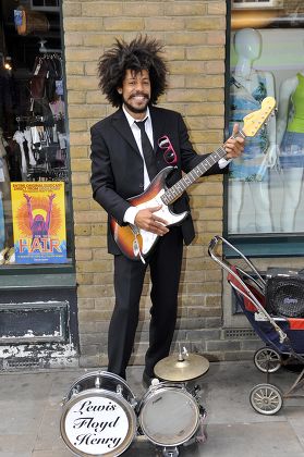 Busker Lewis Floyd Henry In Brick Lane Where He Was Spotted And Picked To Play At Festivals This Summer Photograph By Glenn Copus