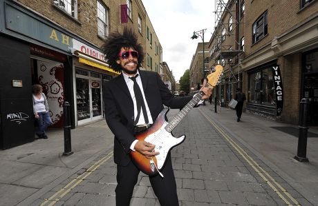 Busker Lewis Floyd Henry In Brick Lane Where He Was Spotted And Picked To Play At Festivals This Summer Photograph By Glenn Copus