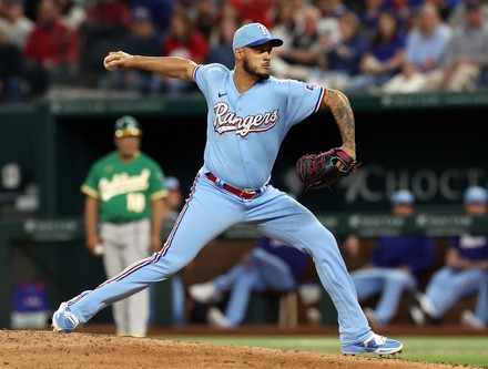 Texas Rangers relief pitcher Jonathan Hernandez throws to the