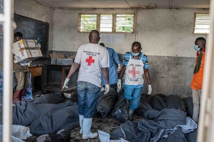 Red Cross Volunteers Carry Bodies Flash Editorial Stock Photo - Stock