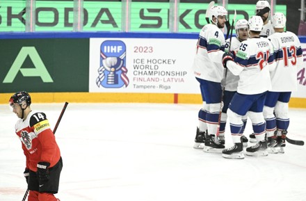Games mascot Spiky sits on the goal before the 2023 IIHF Ice