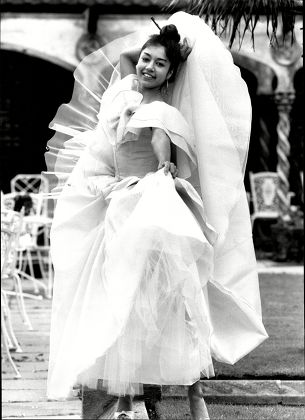 Seeta Indrani Wearing A Ballgown By Benny Ong Costing A500 At The Main Season Fashion Exhibition At The Kensington Exhibition Centre In London