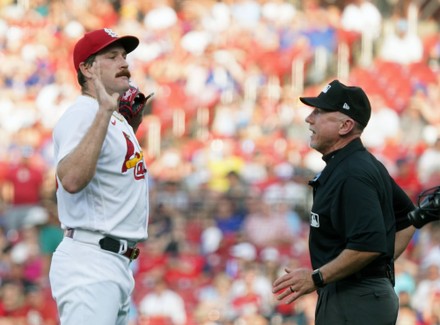 Miles Mikolas of the St. Louis Cardinals wears socks honoring Armed News  Photo - Getty Images