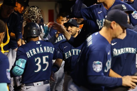 Seattle Mariners Vs. New York Mets Seattle Mariners Teoscar Hernandez 35 is  handed the trident after