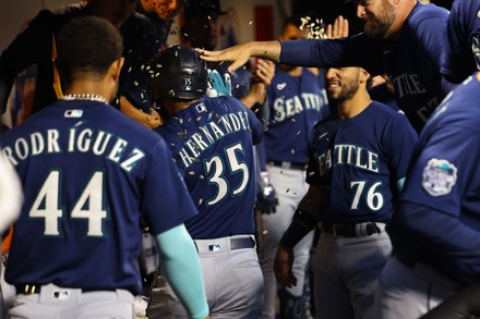 Seattle Mariners Vs. New York Mets Seattle Mariners Teoscar Hernandez 35 is  handed the trident