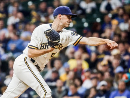 Hoby Milner of the Milwaukee Brewers throws during a baseball game