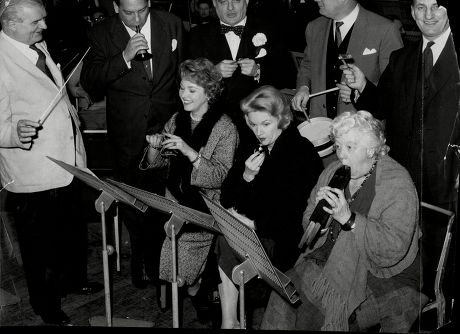 Conductor Herman Lindars Rehearses Dance Band Leader Edmundo Ros Lord Boothby Cliff Michelmore Sir Leonard Hutton Katie Boyle Moira Lister And Margaret Rutherford At The Royal Albert Hall For A Christmas Concert.