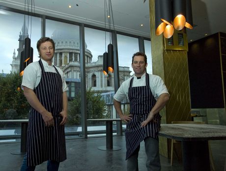 Chefs Jamie Oliver And Adam Perry Lang At Their New Restaurant In Cheapside.london: Jamie Oliver Today Urged Londoners To Unleash Their 'inner Caveman' As He Announced A A3 Million Shrine To Meat-eating In The Heart Of The City. His Latest Restaura