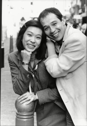 Actor David Yip And Actress Lucy Sheen Take A Break From Filming