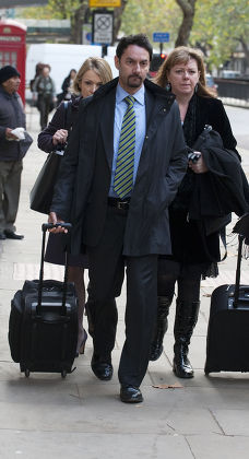 Jay Hunt Arrives For An Industrial Tribunal Hearing Pictured To The Left Hiding Behind Her Legal Team Holborn London.