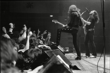 Motorhead Pictured In Concert In 1982. Left Is Guitarist Fast Eddie Clarke And Right Is Lemmie Kilminster Lead Singer And Bassist.