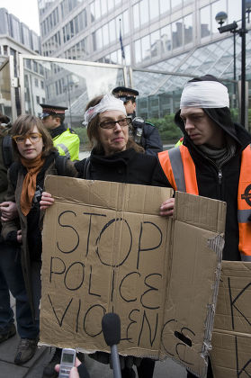 Susan Meadows demonstrates outside Scotland Yard, London, Britain
