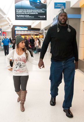 Shaquille O'Neal and Nicole Alexander at Newark Airport, New Jersey, America - 17 Jan 2012