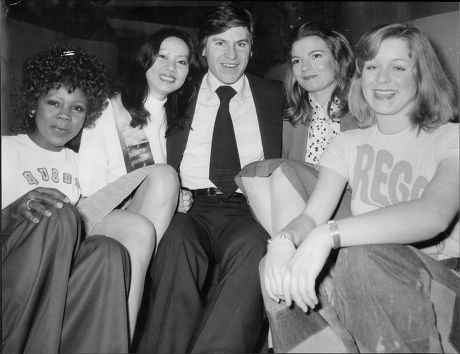 Alan Price Singer And Musician With International Girls From Various Stands At At Ideal Home Exhibition 1975- Beverley Hay Cindy Ng Melissa Flatt And Val Mitchell.