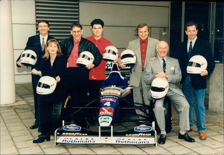 Murray Walker Martin Brundle Jim Rosenthal Simon Taylor Tony Jardine James Allen And Louise Goodman All Of The Itv Sport Grand Prix Commentary Team Here With A Formula 1 Racing Car And Crash Helmets 1997.