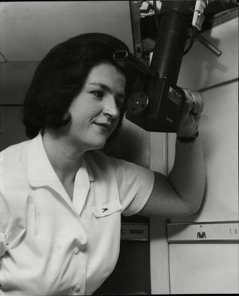 Susan Graham Boac Stewardess Looks Through Periscope On Airliner To Check Engines 1964.