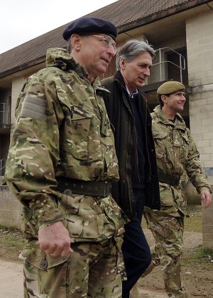 Defence Secretary Philip Hammond visit to the 12th Mechanized Brigade at Copehill Down, Salisbury Plain Training Area, Wiltshire, Britain - 09 Mar 2012
