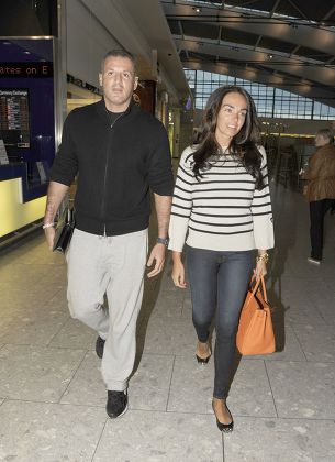 Tamara Ecclestone and Omar Khyami at Heathrow Airport, London, Britain - 26 Apr 2012