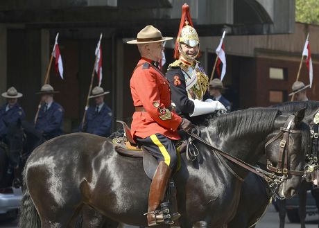 Canadian mounties rehearse with members of the Household Cavalry to guard the Queen at Horse Guards Parade, London, Britain - 22 May 2012