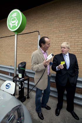 Mayor Boris Johnson Driving An Electric Car Into An Asda Car Park In Kingston Launches 'source London' The First Ever City Wide Charge Point Network For Electric Car Drivers . Picture With Quentin Wilson