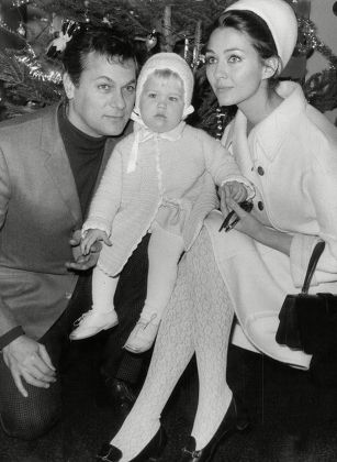 Actor Tony Curtis (died 9/10) With His 2nd Wife Christine Kaufmann And Their 15-month-old Daughter Alexandra In 1965.