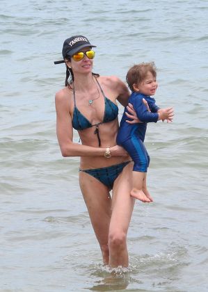 Luciana Morad with sons Lorenzo Gabriel and Lucas Jagger at Miami Beach, Florida, America  - Jul 2012