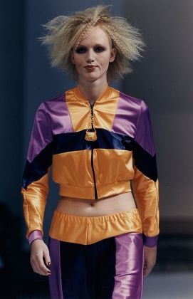 A Model Wears A Multi-coloured Leisure Suit From Katherine Hamnett On The Runway In Milan.