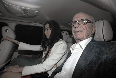 Rupert Murdoch Arrives Back Home To His Mayfair Flat Tonight At 10pm With His Wife. His Son Lachlan Is Next To Rupert's Wife Wendy Deng But Is Obscured In This Picture. 19th July Pic By James Emmett.