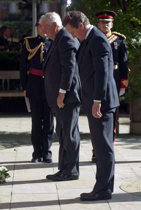 The U.s. Ambassador Louis Susman Left With Prime Minister David Cameron Pay Tribute To The Victims Of The U.s. Terror Attacks During A Ceremony At The 9/11 Memorial Garden In London To Mark The 10th Anniversary Of The Attacks.