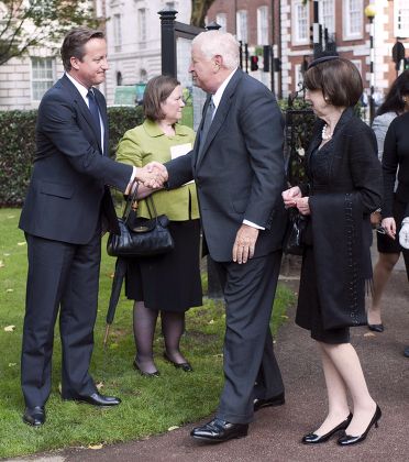 American Ambassador To Great Britain Louis Susman And His Wife Marjorie Meet Prime Minister David Cameron As They Arrive To Attend A Ceremony For Victims Of The Attacks On The World Trade Centre In New York Marking The Tenth Anniversary In Grosvenor